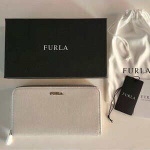 Furla extra large zip around leather wallet. Brand new with tags in box
